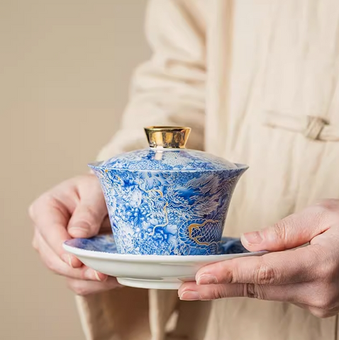 Full flower dragon patterned lid bowl hovering, tea bowl rotating